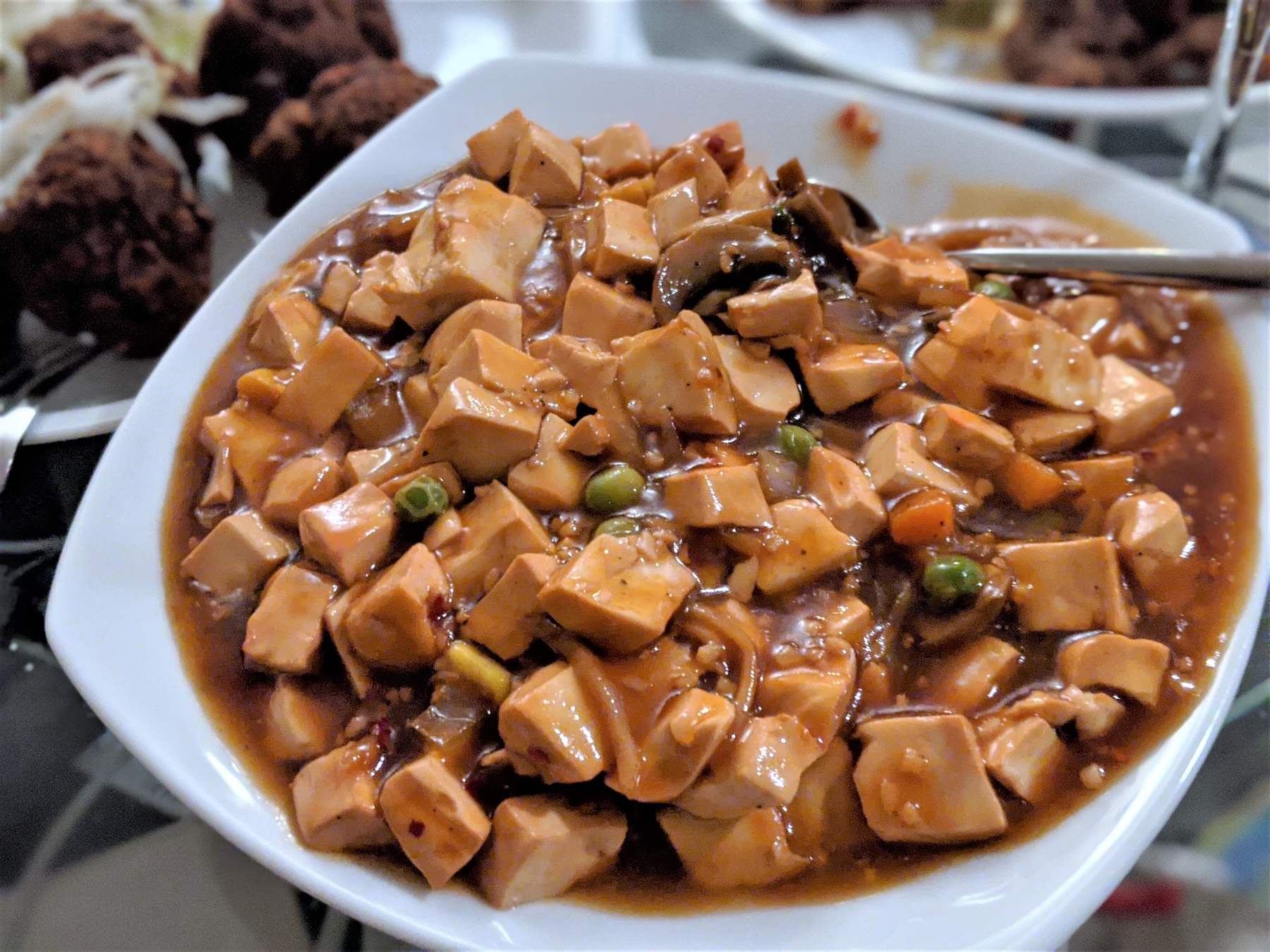 Hakka Chinese food. Bowl of stewed tofu with veggies.