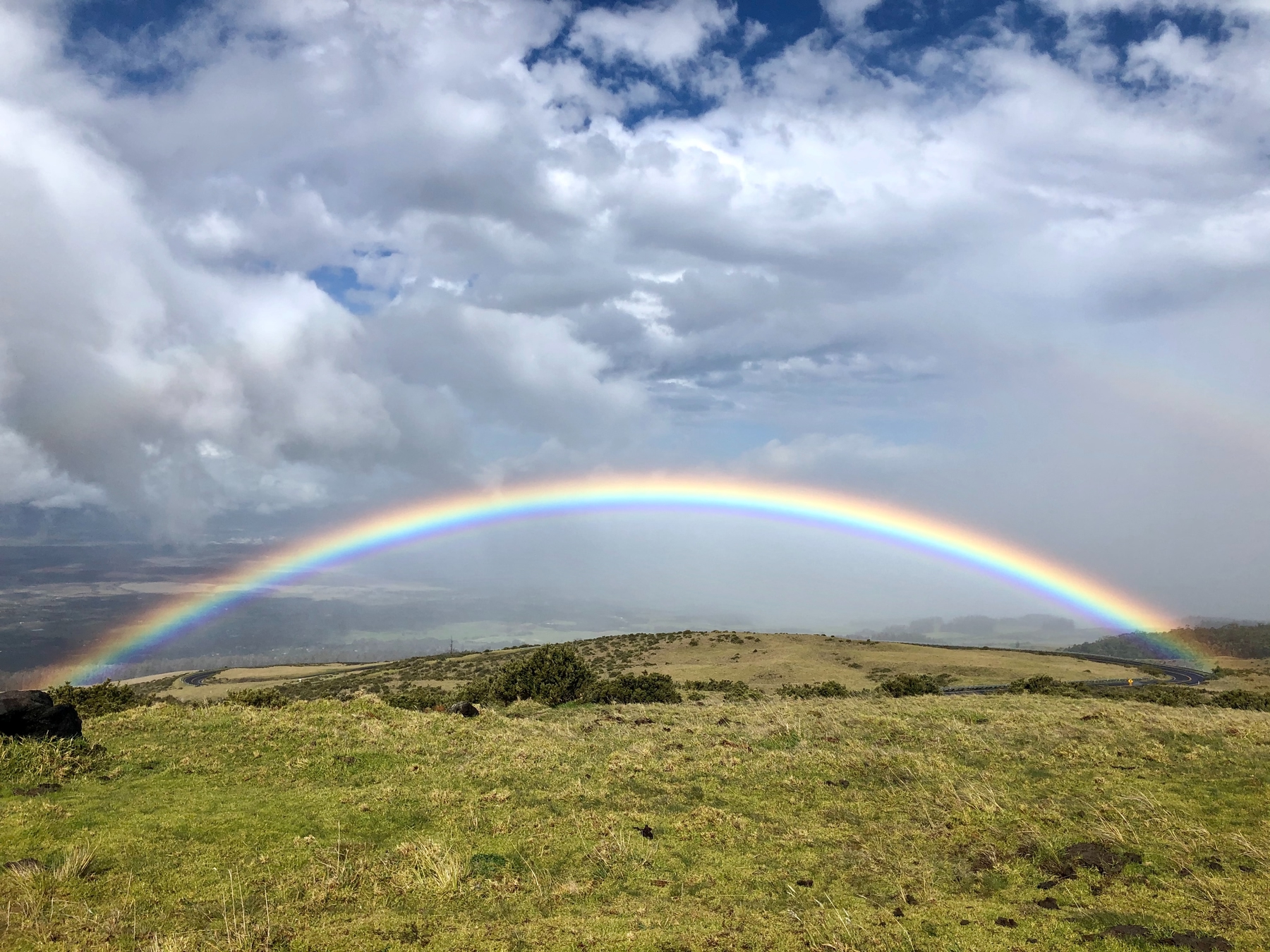 Rainbow on the road leading up to Haleakalā Crater.