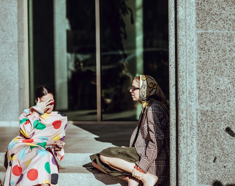 Image of two women waiting for a fashion week event in Tbilisi