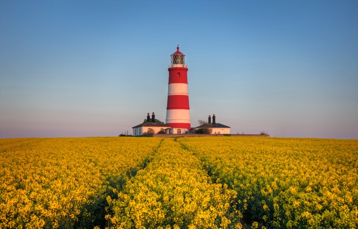 Happisburgh’s red and white striped lighthouse, in Norfolk, is the UK's oldest working lighthouse