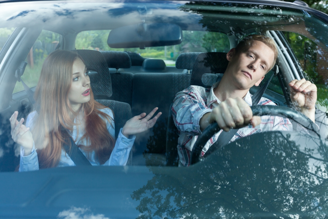 Couple arguing in the car - 10 most common holiday arguments couples have