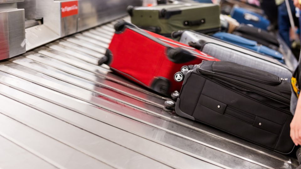 luggage on a carousel 