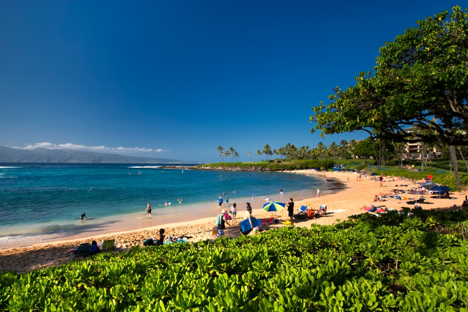 people at the beach on a sunny day in Ka'anapali Beach, Maui, Hawaii