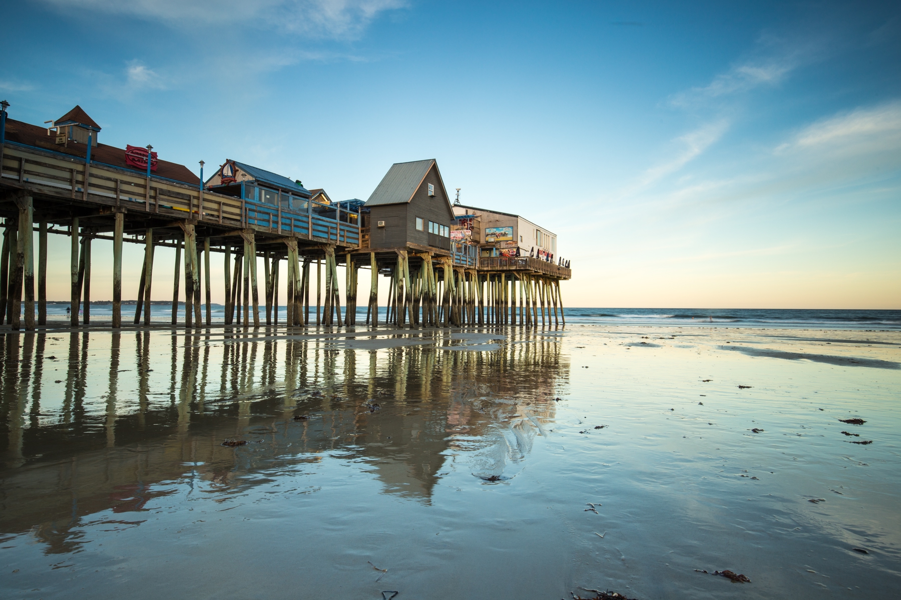 Beach houses on stilts in Orchard Beach, Maine.
