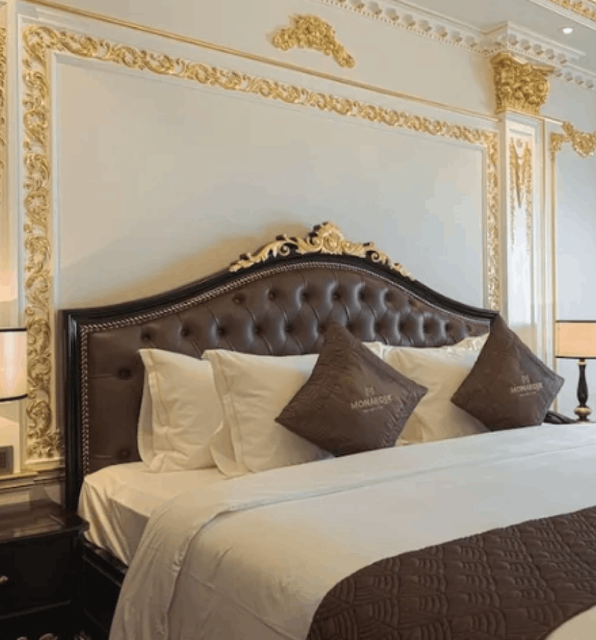 A picture of a king sized bed at Monarque Hotel in Da Nang