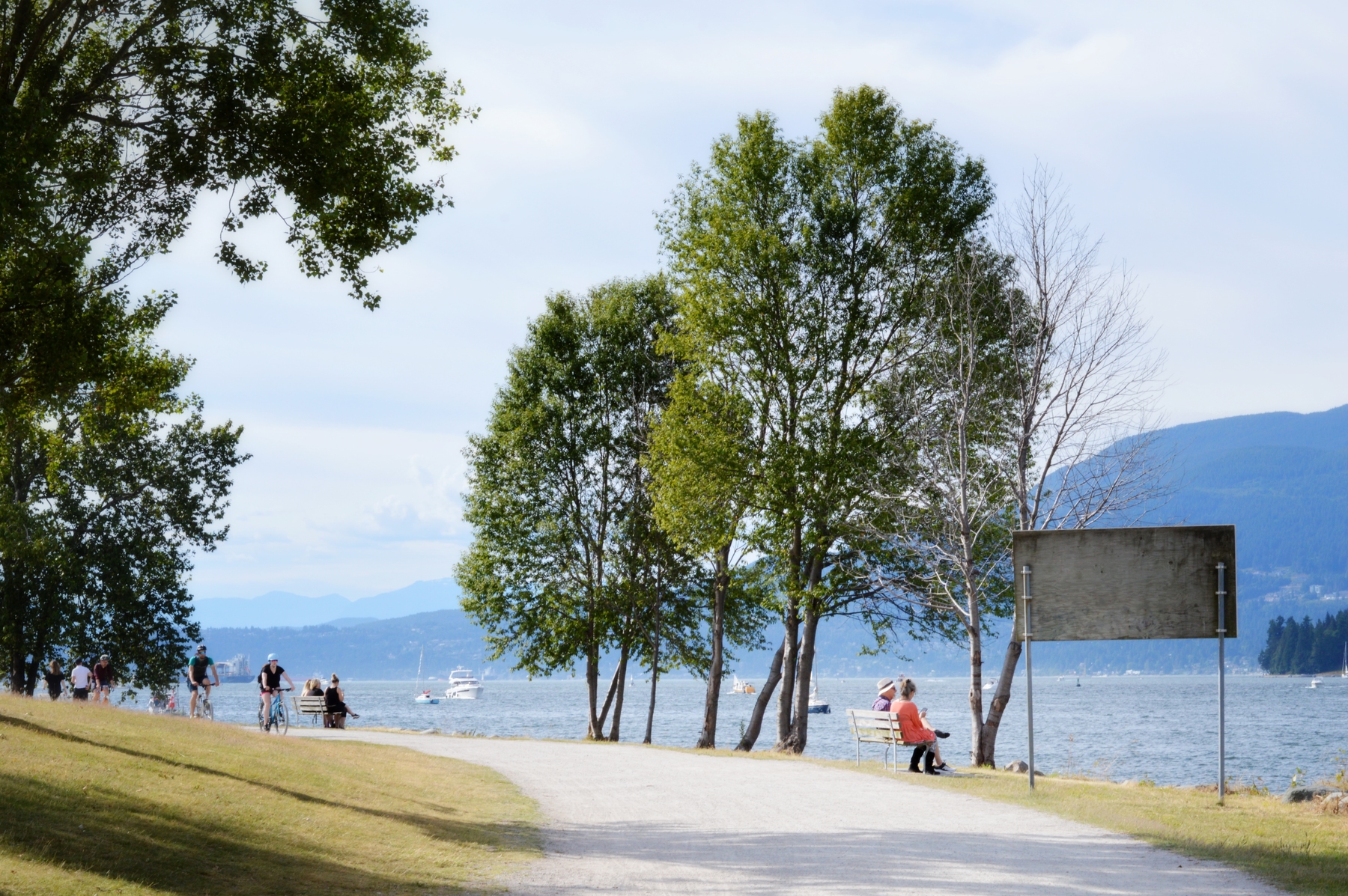 people by the water in Vancouver's Stanley Park