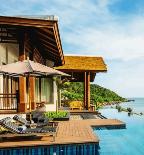 A stylistic picture of the exterior of the Intercontinental Da Nang Sun Peninsula Resort showing its infinity pool and proximity to the sea 