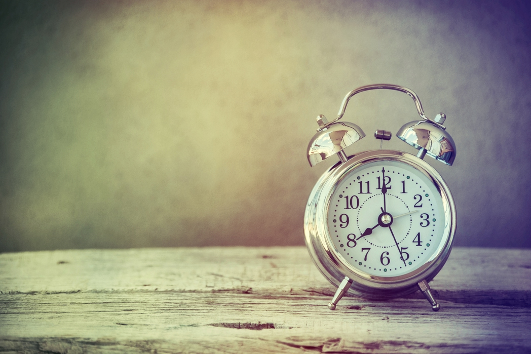 A clock - Choose a flight that makes it easier to sleep