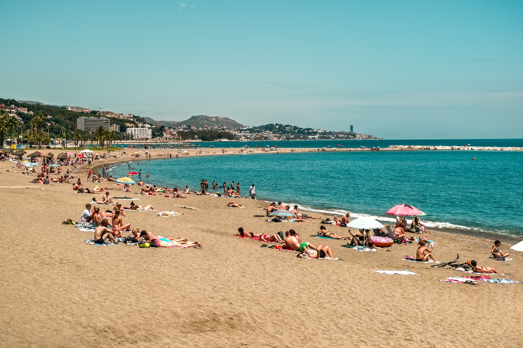 A busy beach in Malaga, Spain.