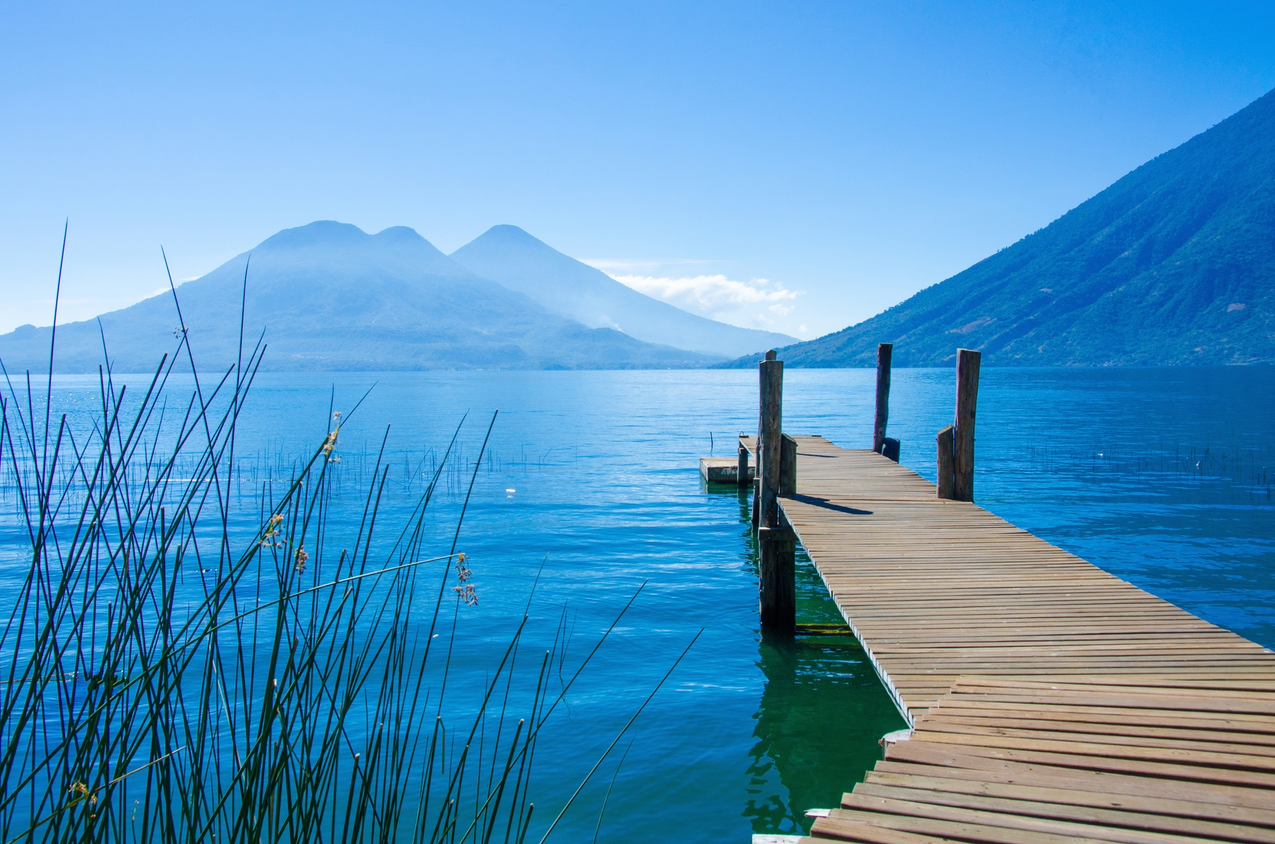 blue lake and volcano in western Guatemala