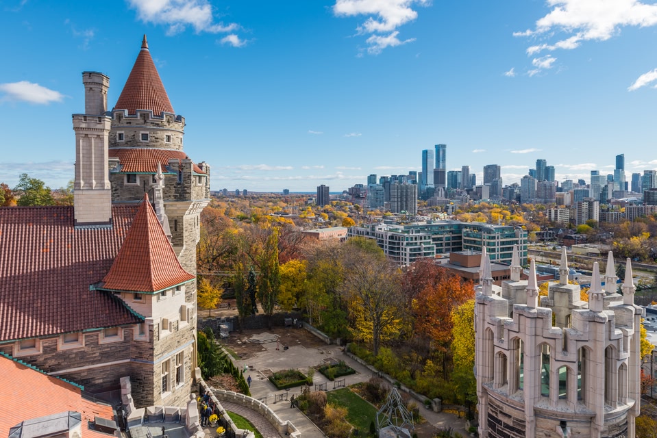Looking out over the towers of Casa Loma toward the Toronto skyline in the distance.