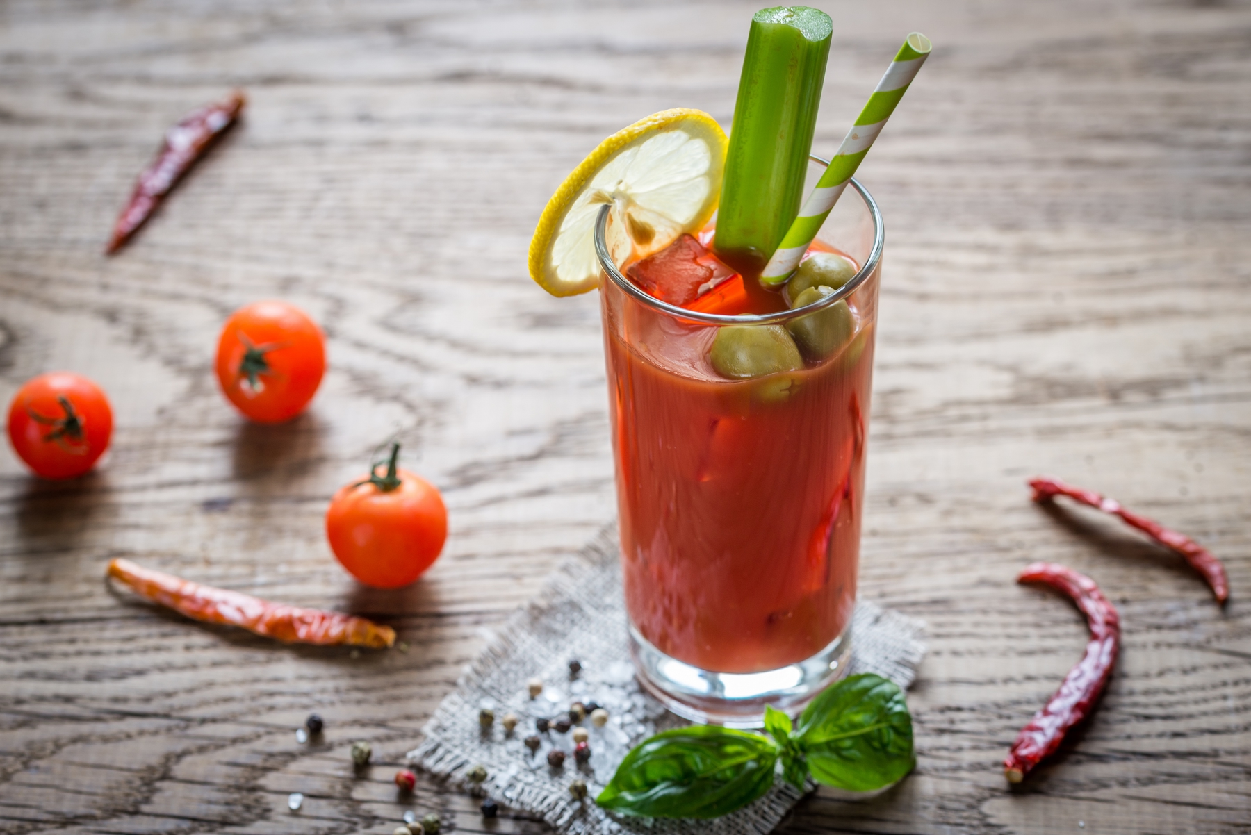 bloody ceasar drink with a lemon and celery stick garnish. Caesars are a must try Canadian specialty