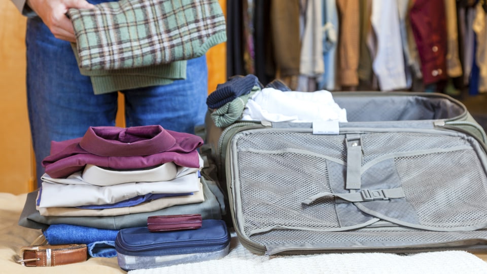 a suitcase being backed