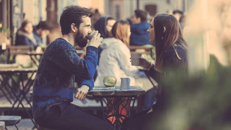 two people having a drink on a restaurant