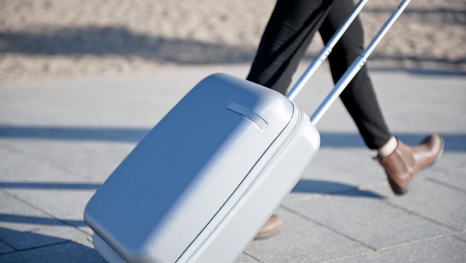 a suitcase being pulled