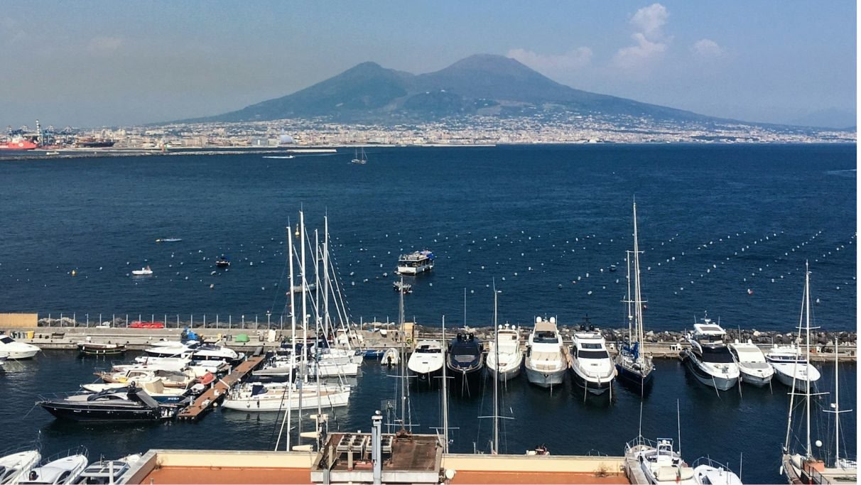 An image of the view of Mount Vesuvius and the port of Naples