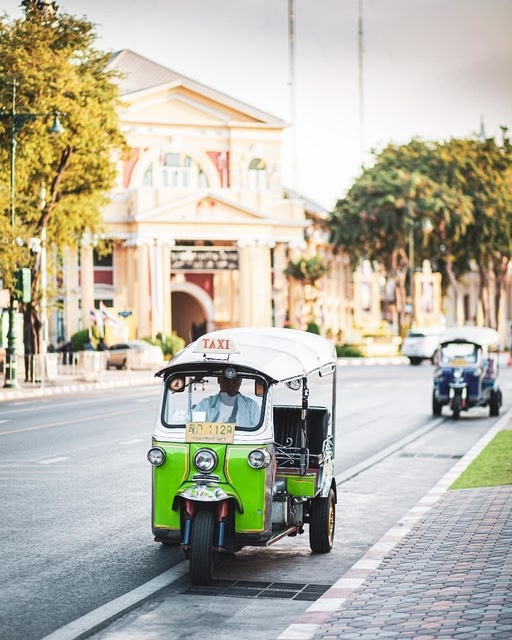 Bright green tuktuk in Bangkok