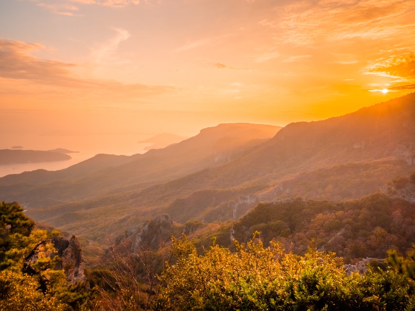 The Landscape of Mountains with Maple Leaves after Sunset in Autumn or Fall, Kankakei in Kagawa Prefecture