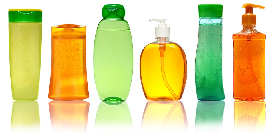 Colourful plastic bottles for liquids - one of Skyscanner's top packing tips is to use cling-film and tape to prevent liquid leaks