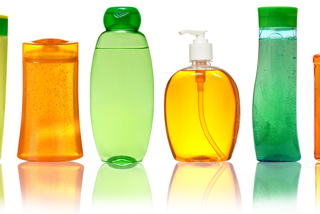 Colourful plastic bottles for liquids - one of Skyscanner's top packing tips is to use cling-film and tape to prevent liquid leaks