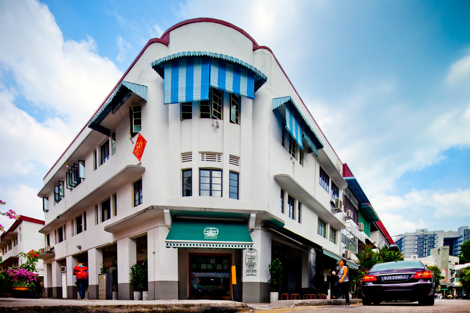 Corner building with car parked outside in Tiong Bahru neighbourhood, Singapore