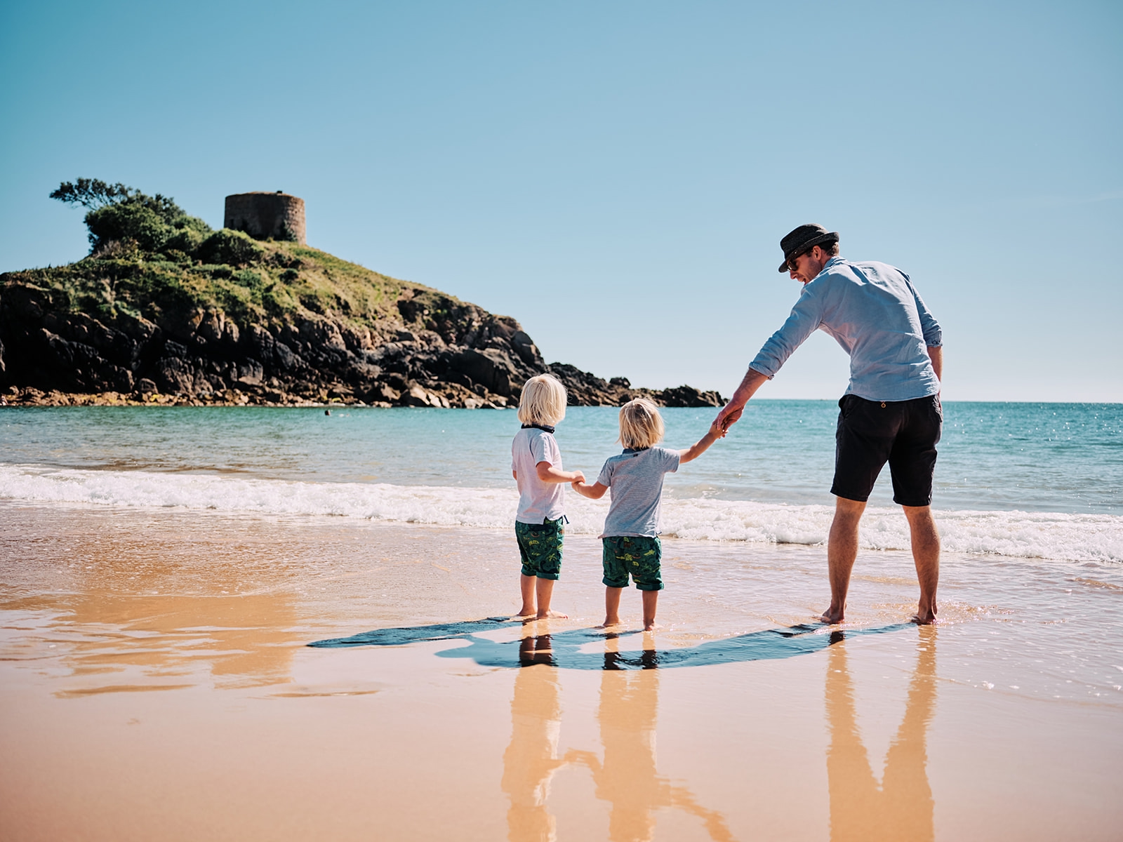 Family on a beach in Jersey