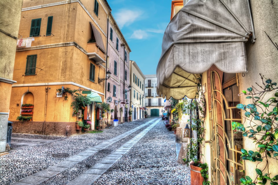 The narrow, cobblestone streets of Alghero, a town in Sardinia.