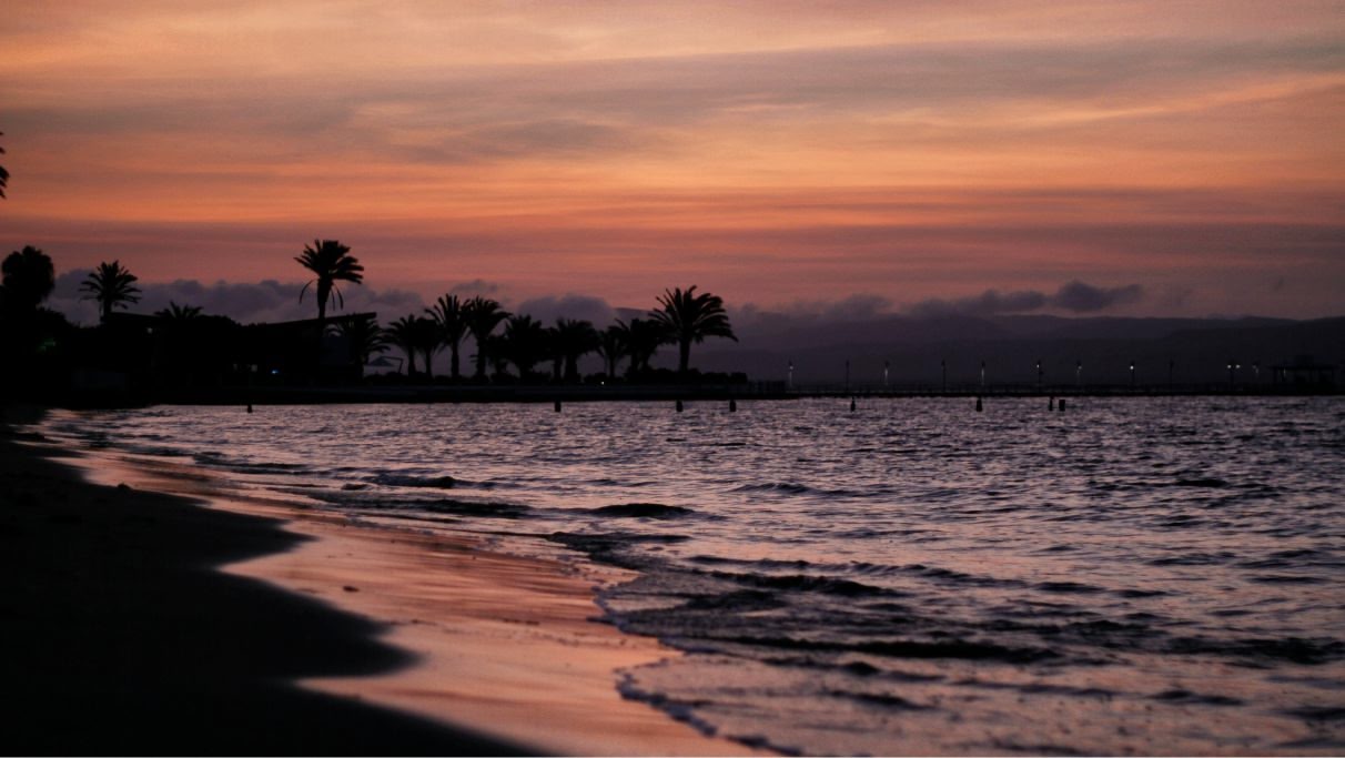 A beautiful image of the seascape during sunset time with warm tones in the sky
