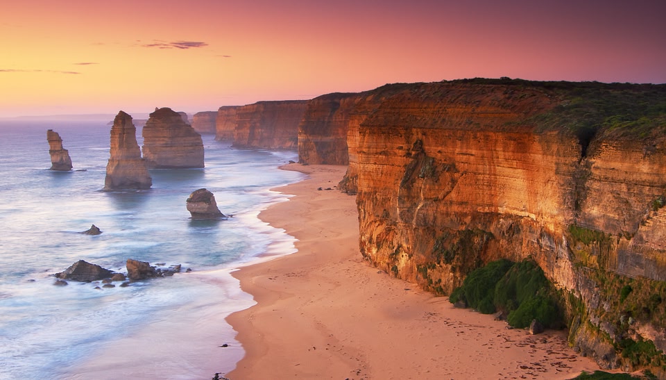 The 12 Apostles in Victoria at sunset, part of the popular Great Ocean Road journey. 