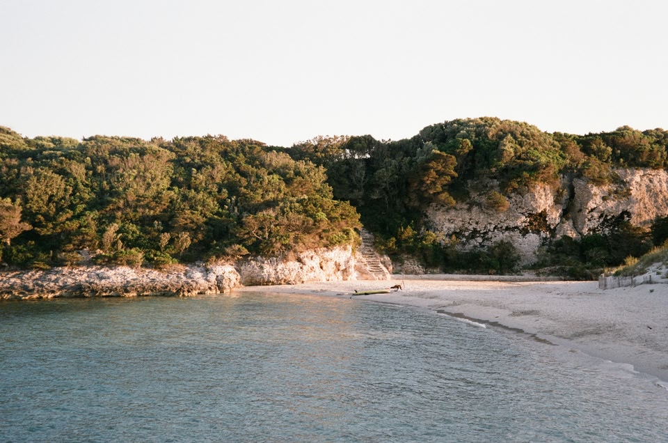 A hillside road cutting through the Corsican hillside