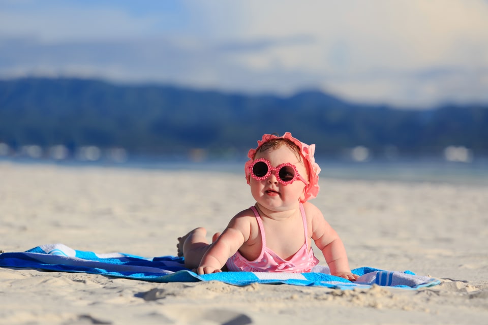 Baby girl on a beach