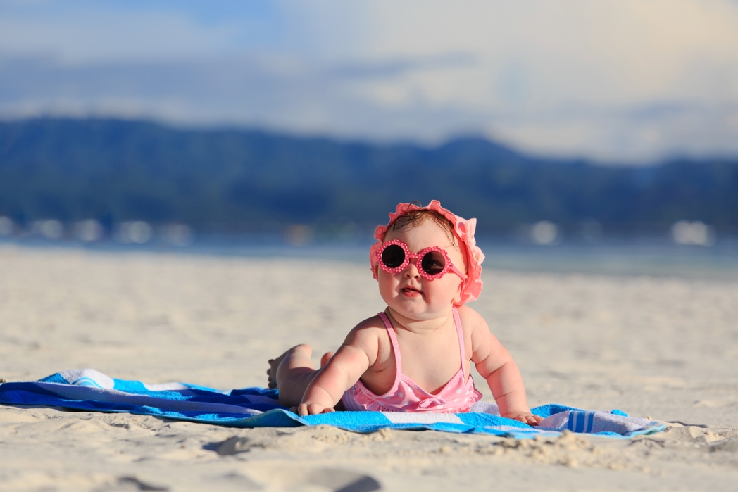 Baby girl on a beach
