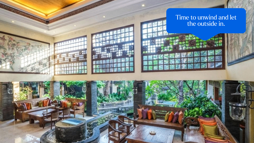 Experience the beauty of a traditional Bali resort with this shot of a cozy seating area. The space is adorned with intricate decorations that showcase the rich cultural heritage of Bali.