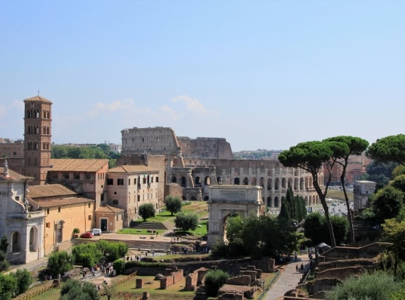 View of the Roman Forum in Rione Campitelli district, Rome, from above. You can see roman buildings including famous arches. It is located west of the Colosseum.