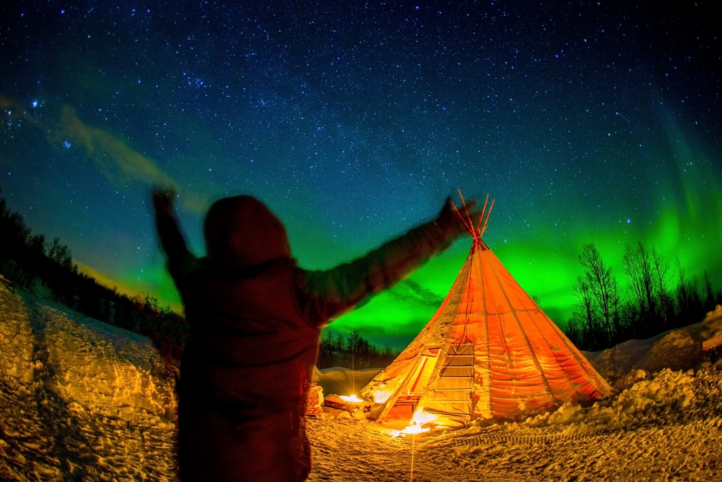 Traveller spotting the Northern Lights in Norway