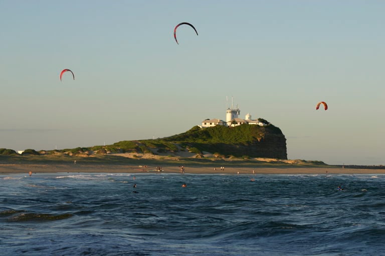 Visit Nobby's lighthouse after visiting the nearby dog-friendly beach