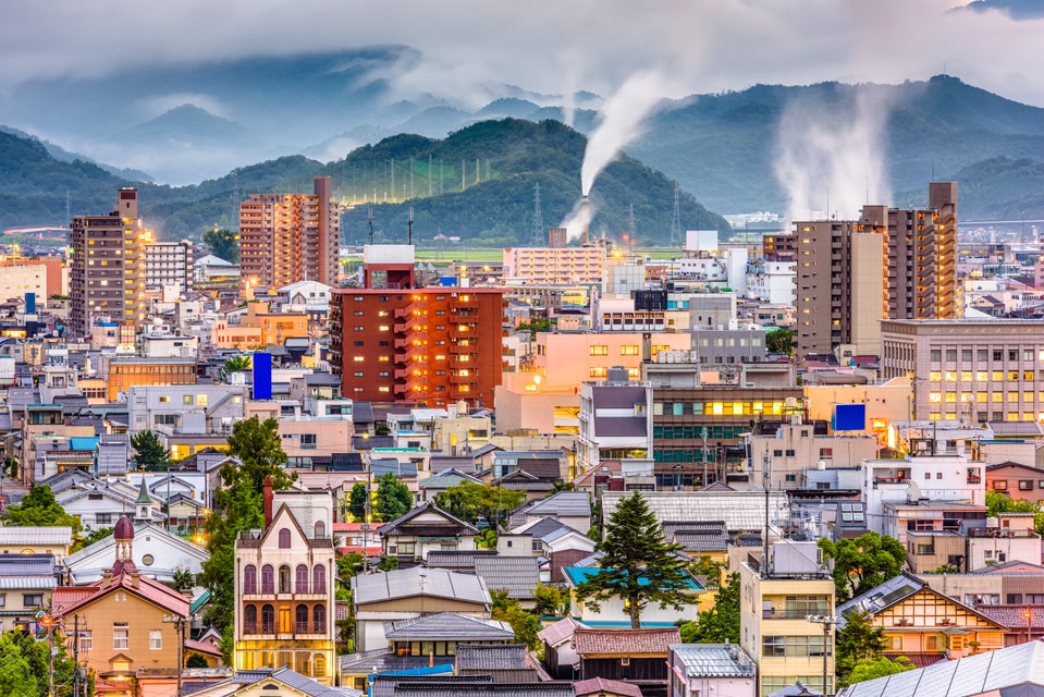 Tottori, Japan town skyline at dusk.