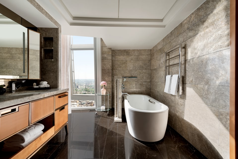 Bathroom at Shangri-La The Shard featuring a free-standing bath
