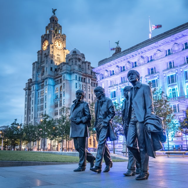 Beatles sculpture and Three Graces, Liverpool, Merseyside, England.
