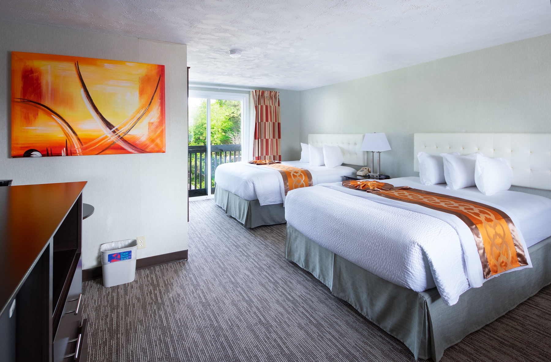 Colorful and clean room at the Cape Sands Inn best beach hotel