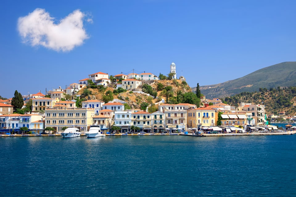 Houses and tower of Poros, Saronic Islands - best Greek Islands to visit in winter