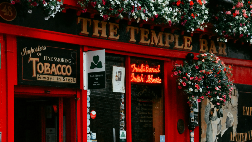 An image of a red and black wooden store.