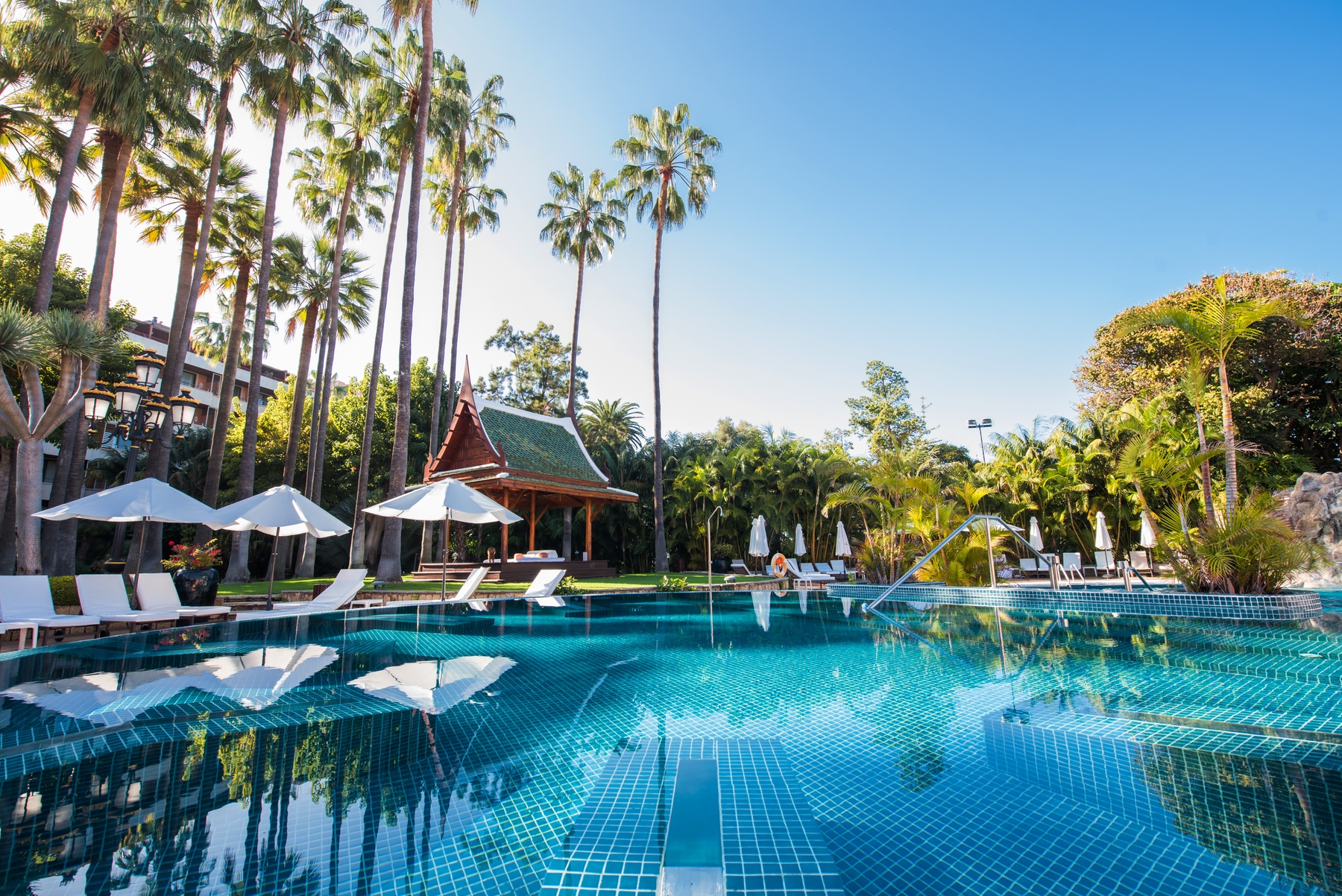 pristine hotel pool with reflections