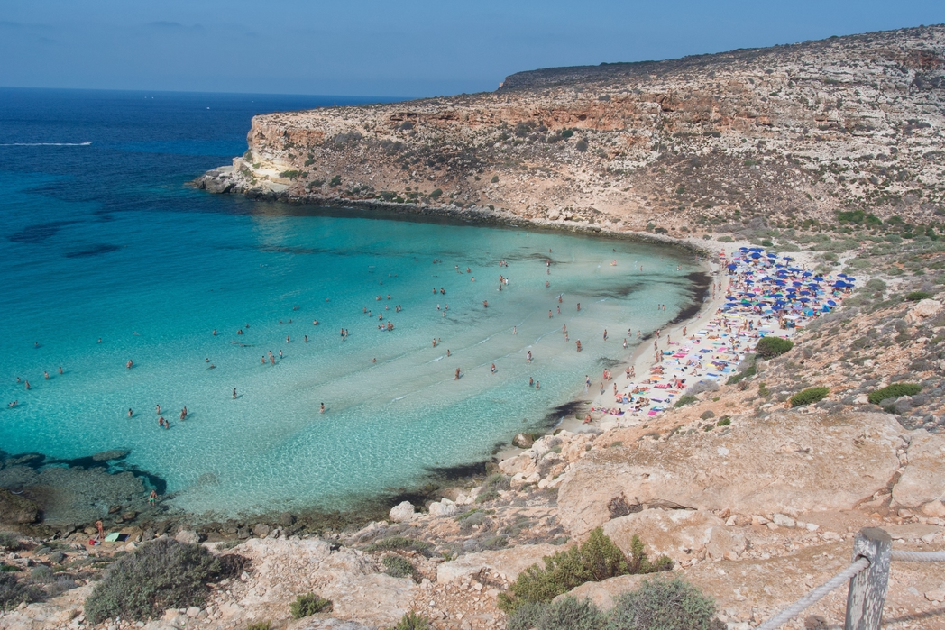 People flock to Rabbit Beach, Lampedusa