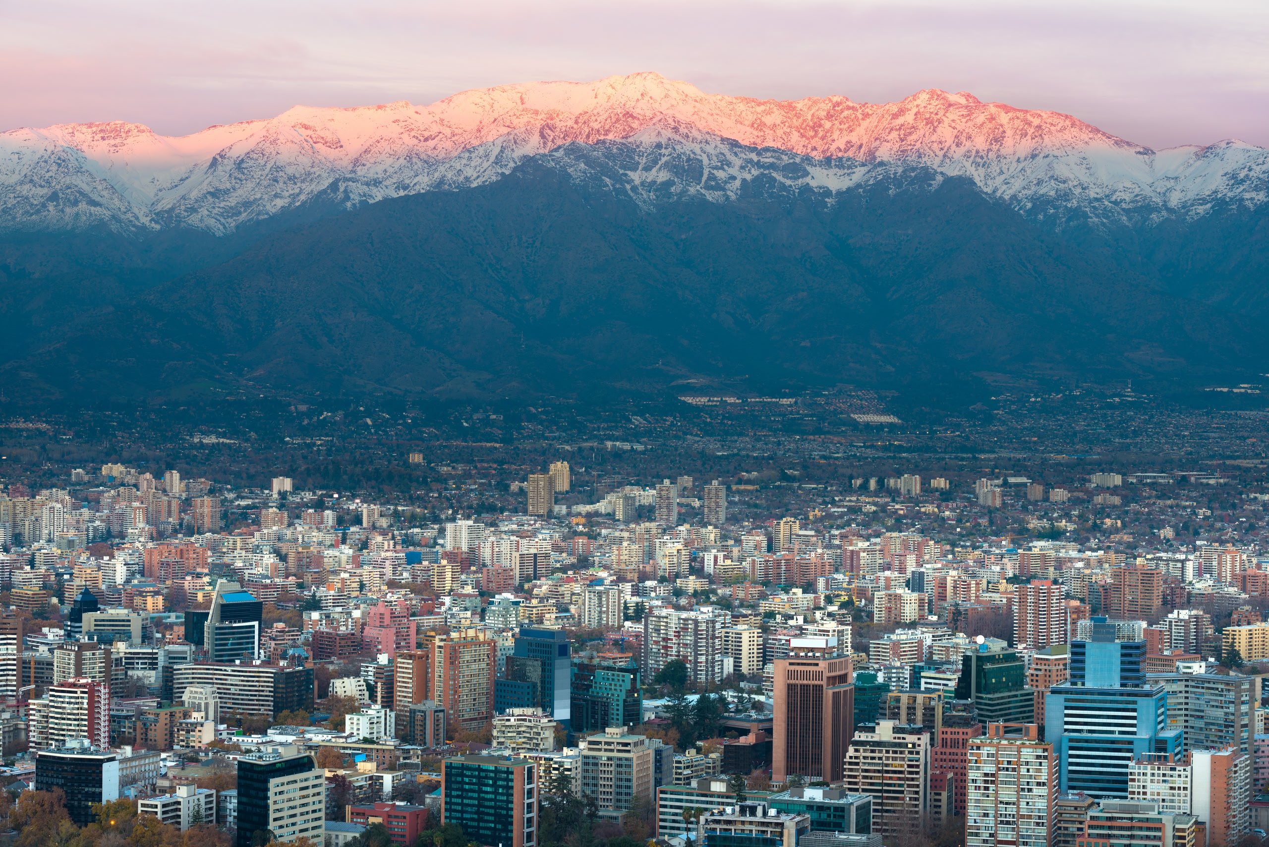 Panoramic view of Providencia in Santiago with Los Andes Mountain Range in the background. 