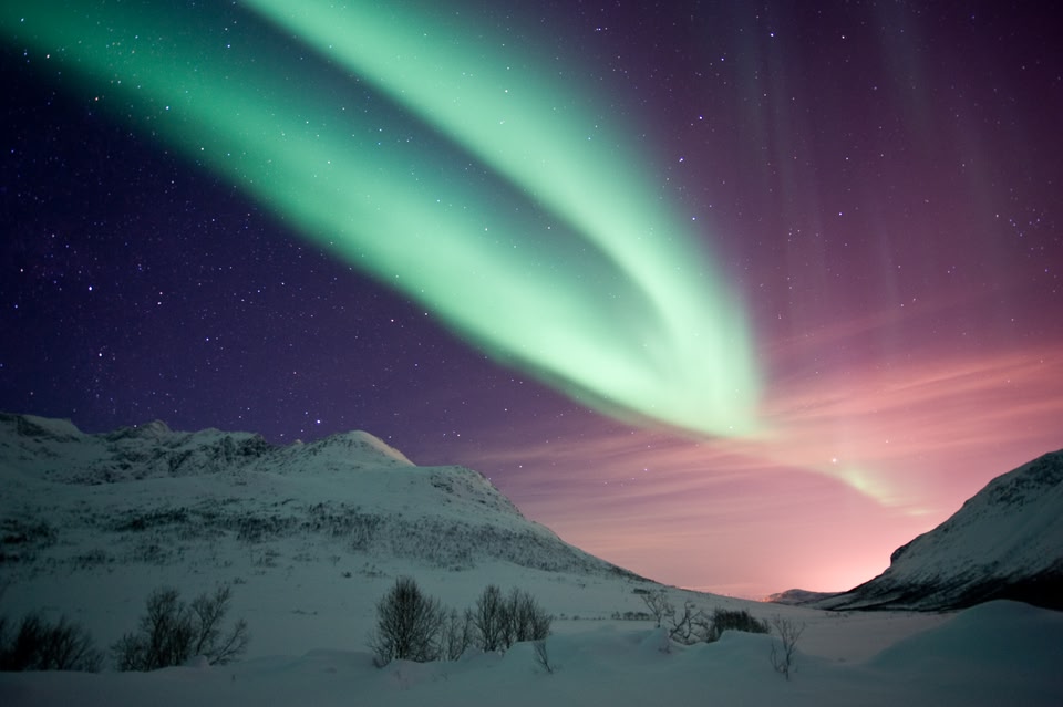 Northern Lights over mountains