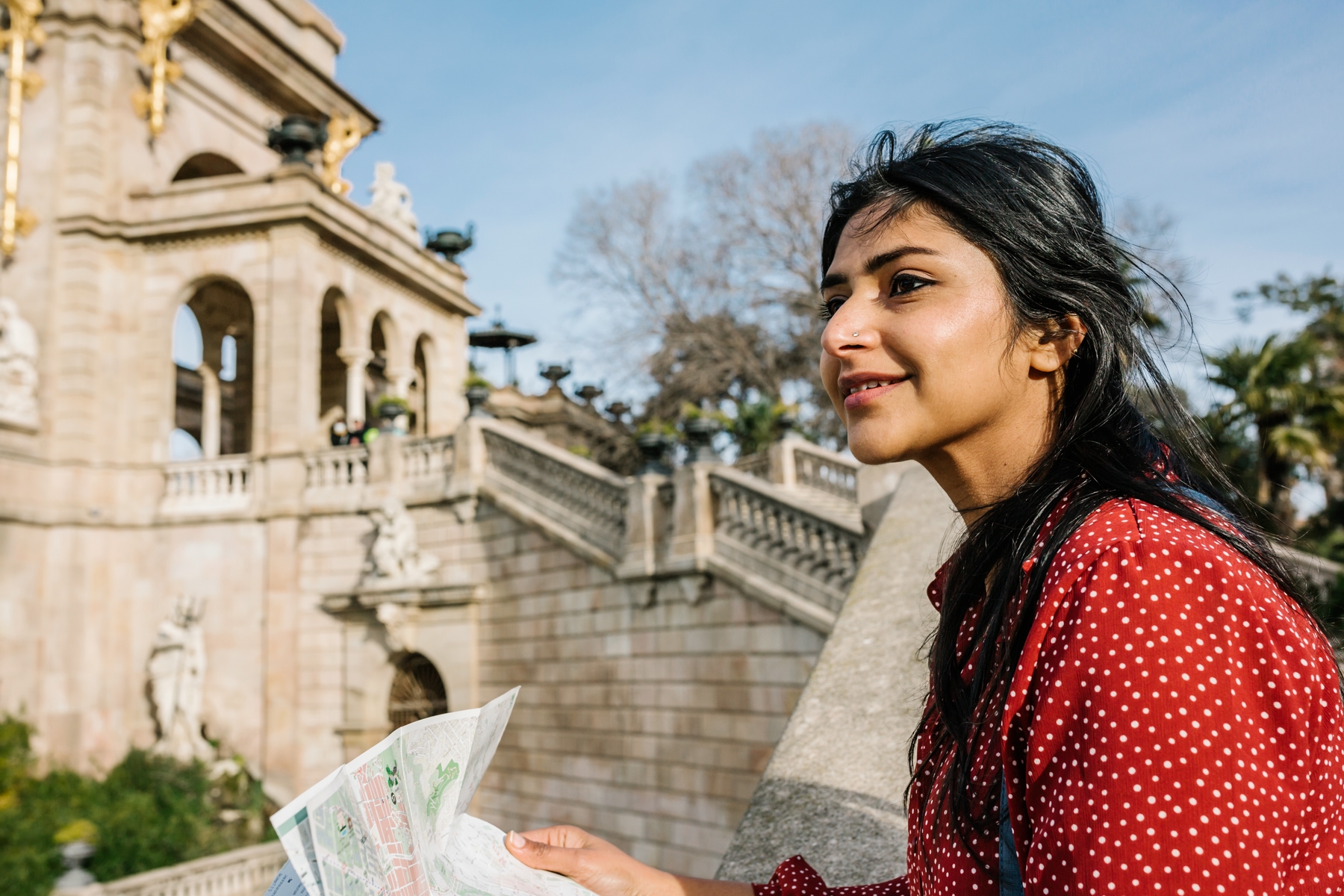 A woman holding a map