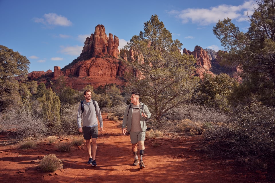 Two male hikers walking through Sedona, Arizona