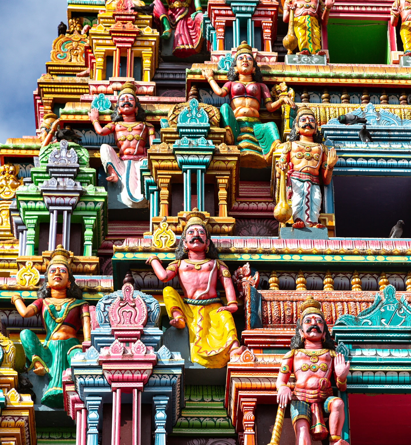 A close up of colourful carvings from Hindu mythology at the Kaylasson Temple, Port Louis, Mauritius.