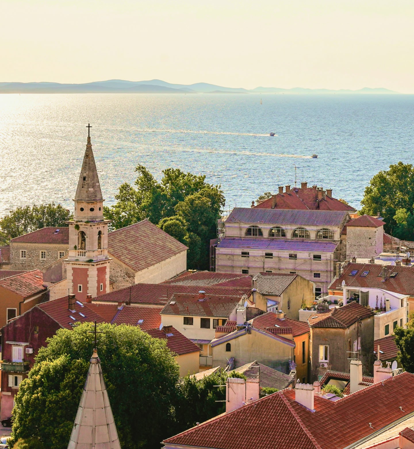 Sun sets over red rooftops in Zadar Croatia